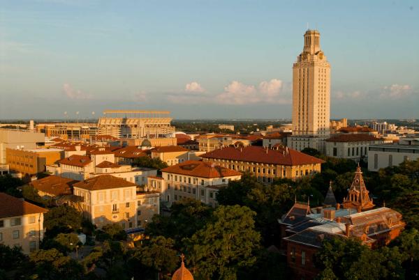 Aerial photo of main tower, Littlefield house and DKR stadium before sunset